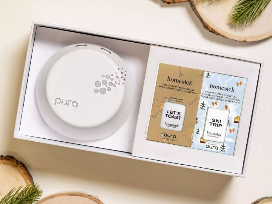 Pura 3 Smart Fragrance Diffuser Set box on table