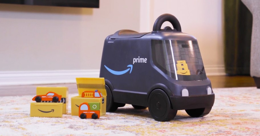 Radio Flyer Amazon Delivery Van ride-on toy with Amazon boxes and toy cars 