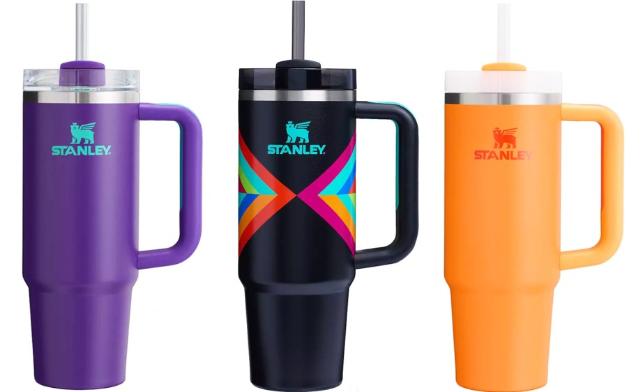 purple, black, and orange stanley tumblers