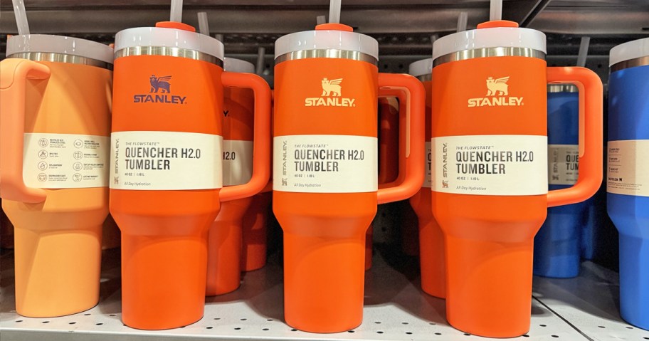 orange Stanley tumblers on store shelf