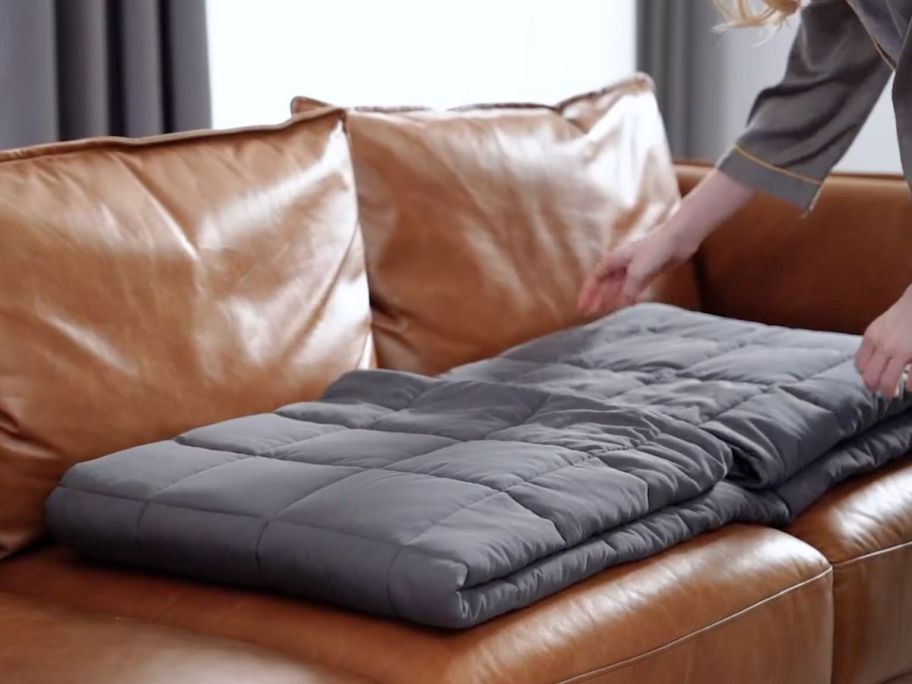 A weighted blanket on a couch