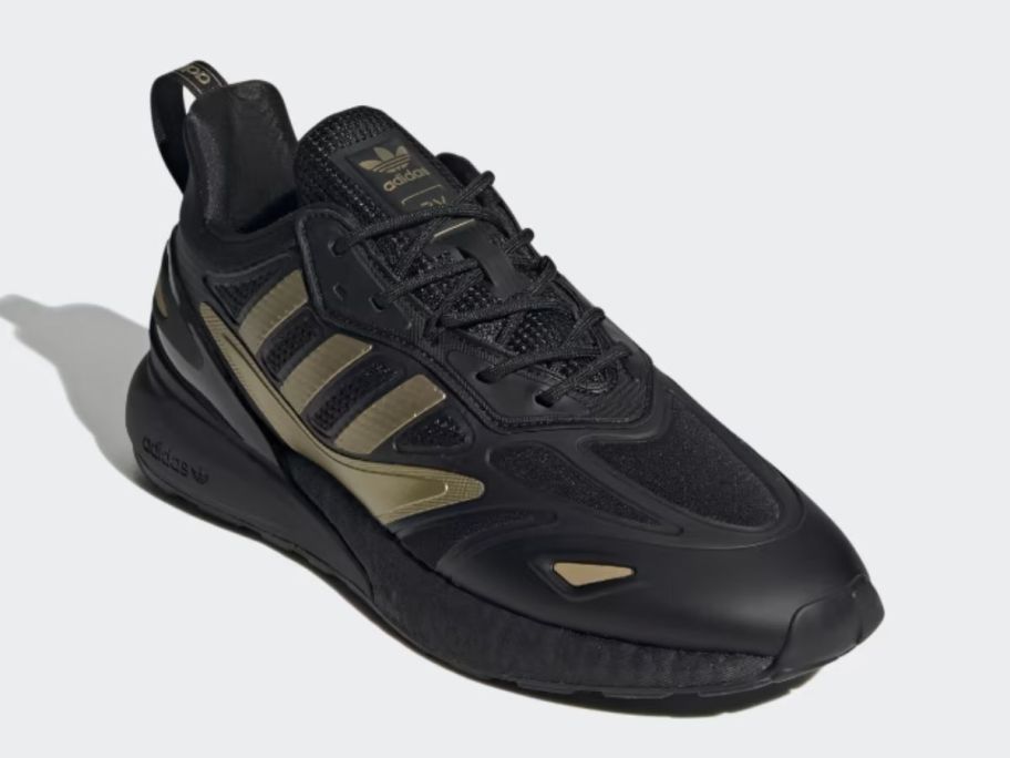 a black and gold mens sneaker