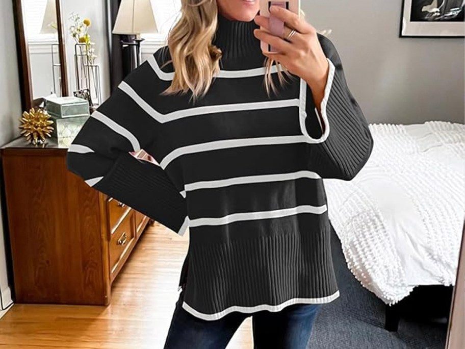 woman wearing black and white striped sweater 