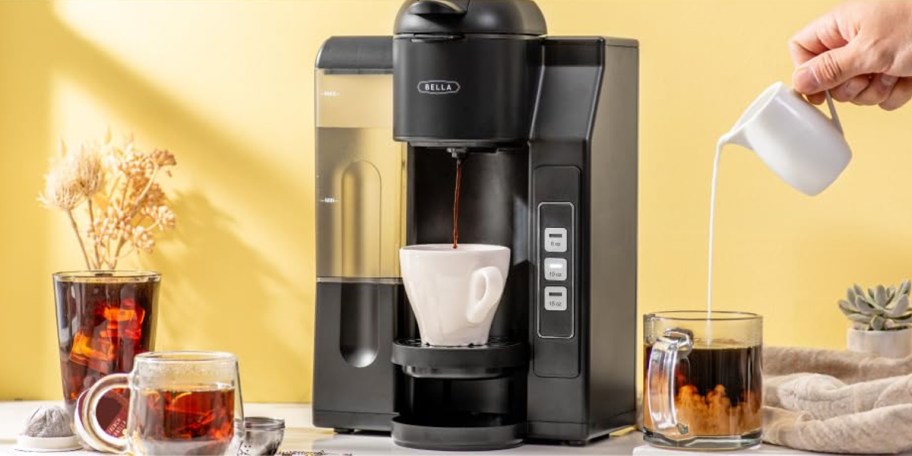 bella coffee maker on table with coffee mug 