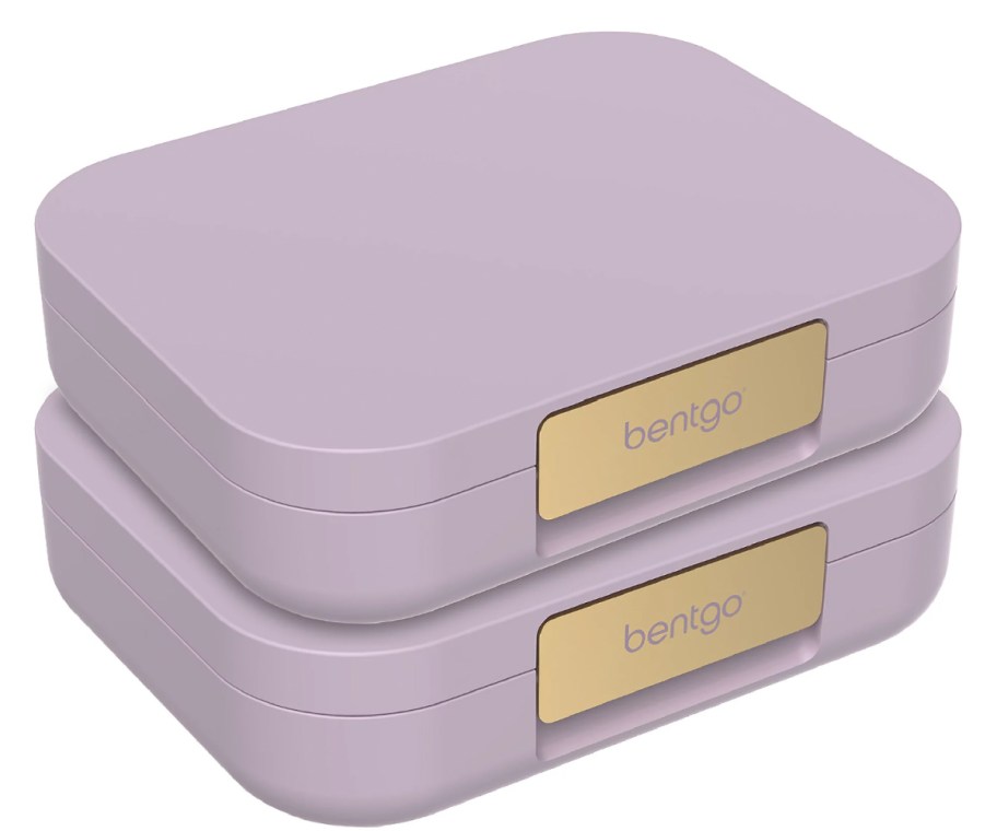 two purple lunchboxes stacked