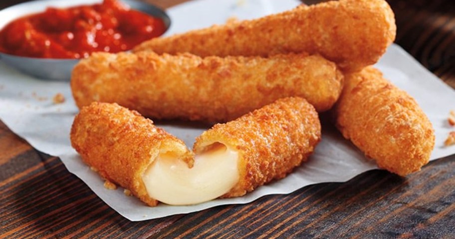 stack of mozzarella fries on table 