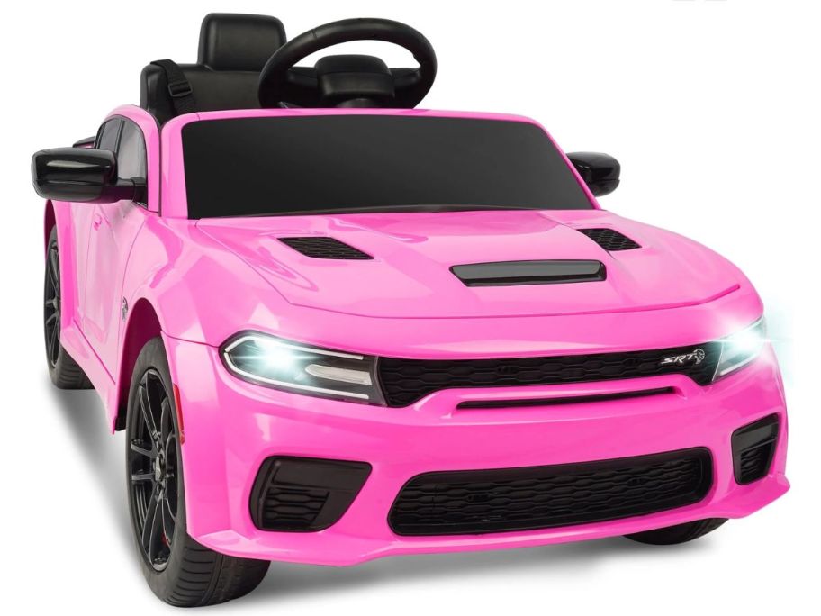 pink dodge ride on toy with white background