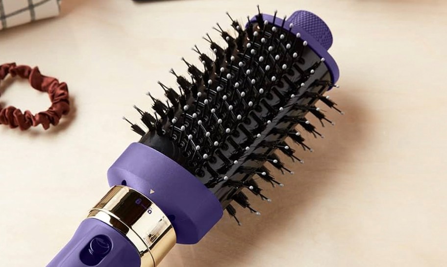 purple volumizer attachment on counter