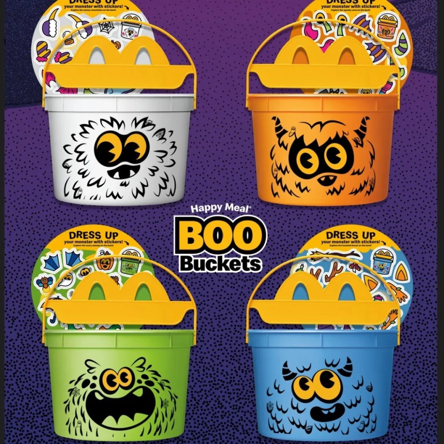 image with 4 McDonalds Happy Meal Boo Buckets in various colors with a monster face and sticker sheets