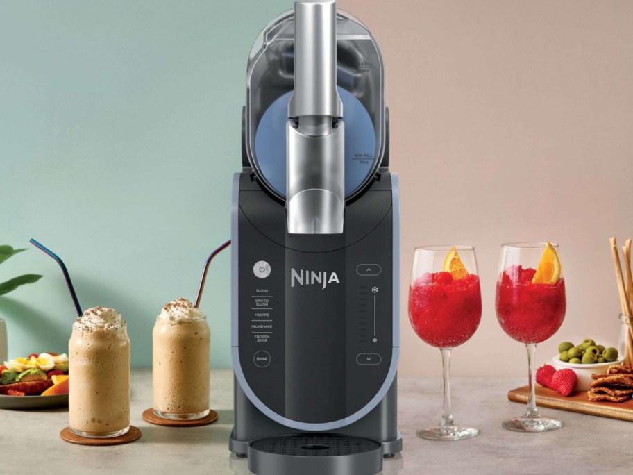 ninja slushi maker with drinks in the side