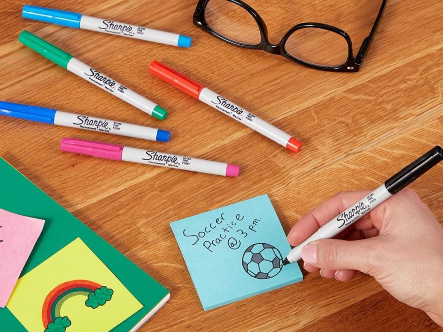 vibrant sharpie markers on desk 