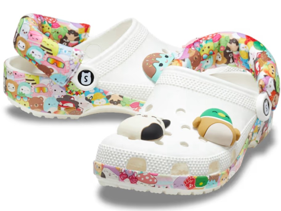 pair of white Crocs shoe with Squishmallow Jibbitz, multi color soles and cushioned heel straps with various Squishmallows on them