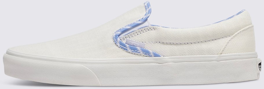 white and blue vans slip on shoe