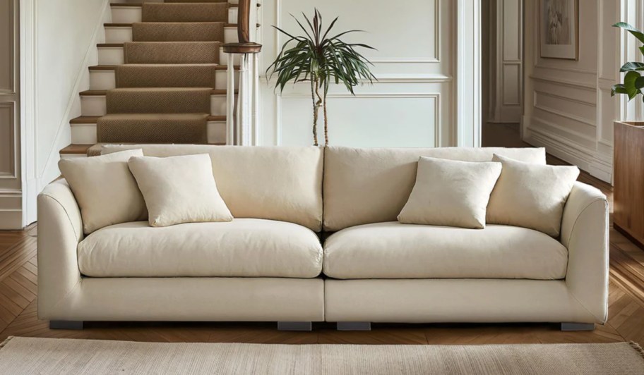 beige feathers loveseat