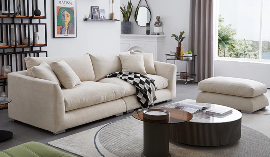 beige sofa and ottoman 