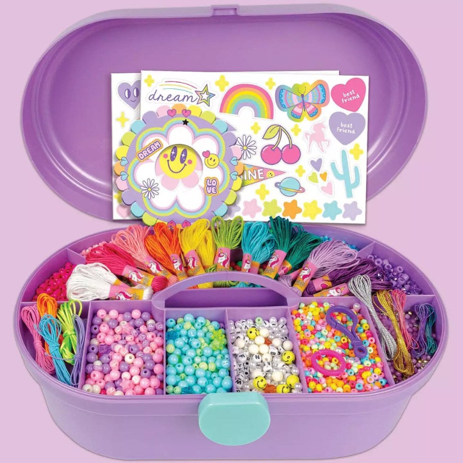 a large purple case with a jewelry making kit in it