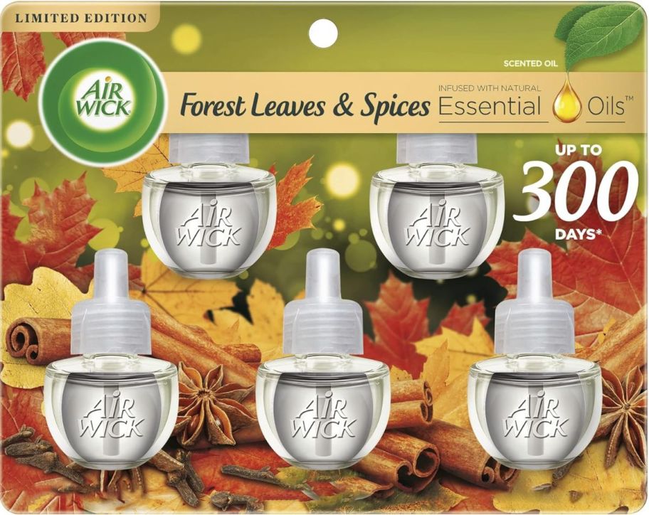 Air Wick Plug in Scented Oil Refill 5 Count forest leaves and spices stock image 