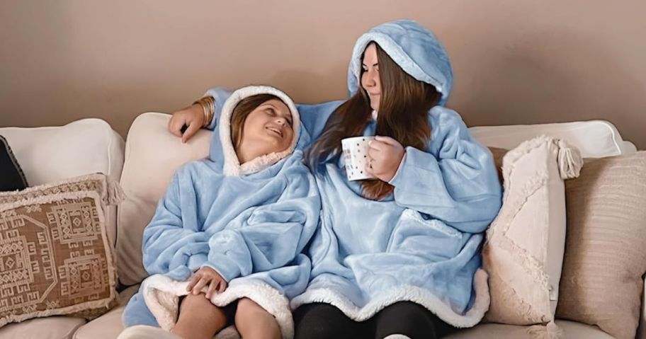 kid and woman wearing Bedsure Oversize Wearable Blanket Hoodies on couch