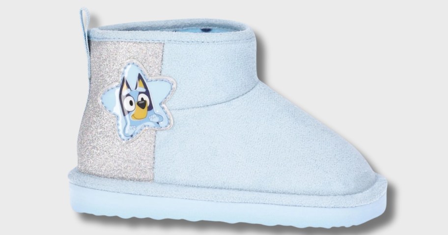 a UGG inspired style toddler girl's boot in light blue with silver and Bluey cartoon character on the side