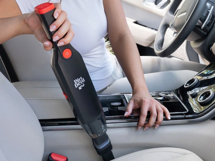 using Dirt Devil Cordless Rechargeable Handheld Slim Vacuum to clean car