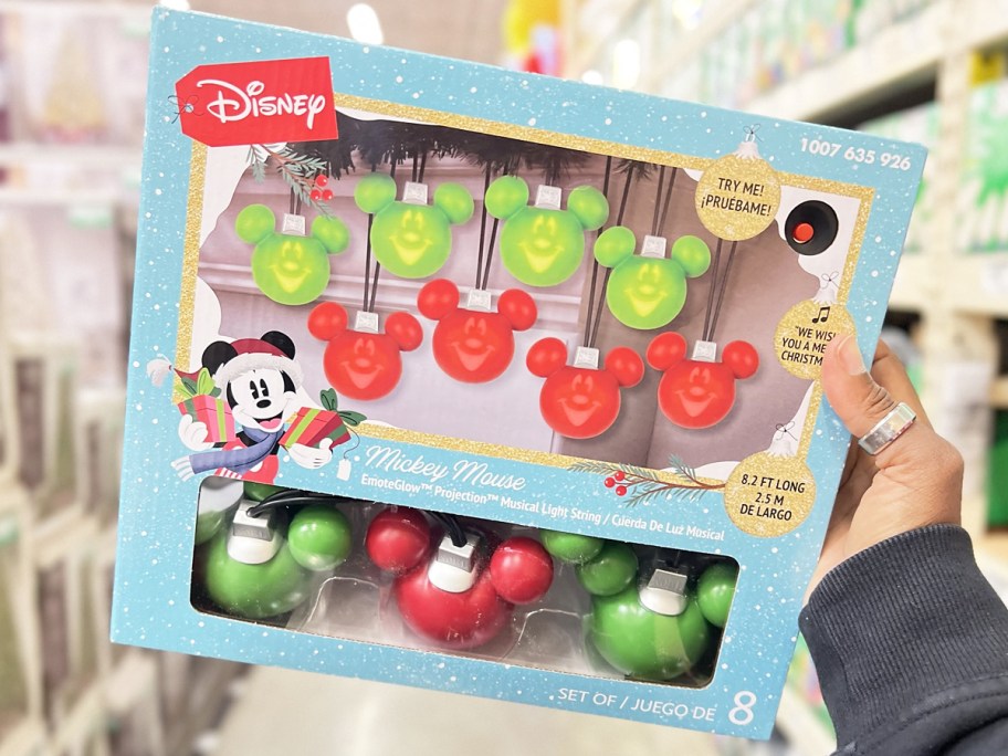 hand holding up a set of Disney Musical Mickey Battery-Operated Lights