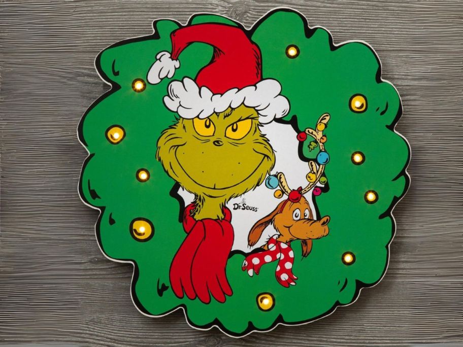 Dr. Seuss Grinch & Max LED Wreath Wall Decor on wall