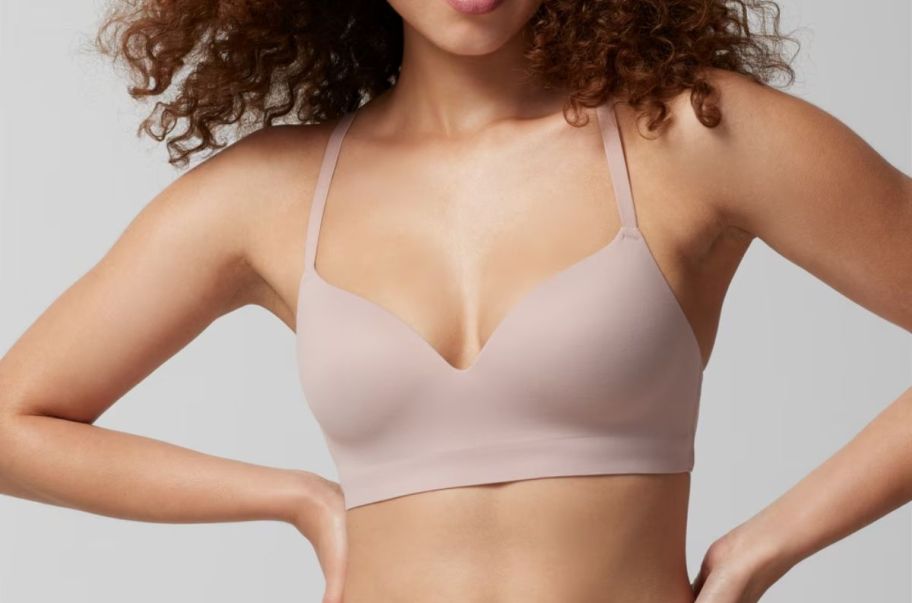 woman wearing a dust pink wireless bra