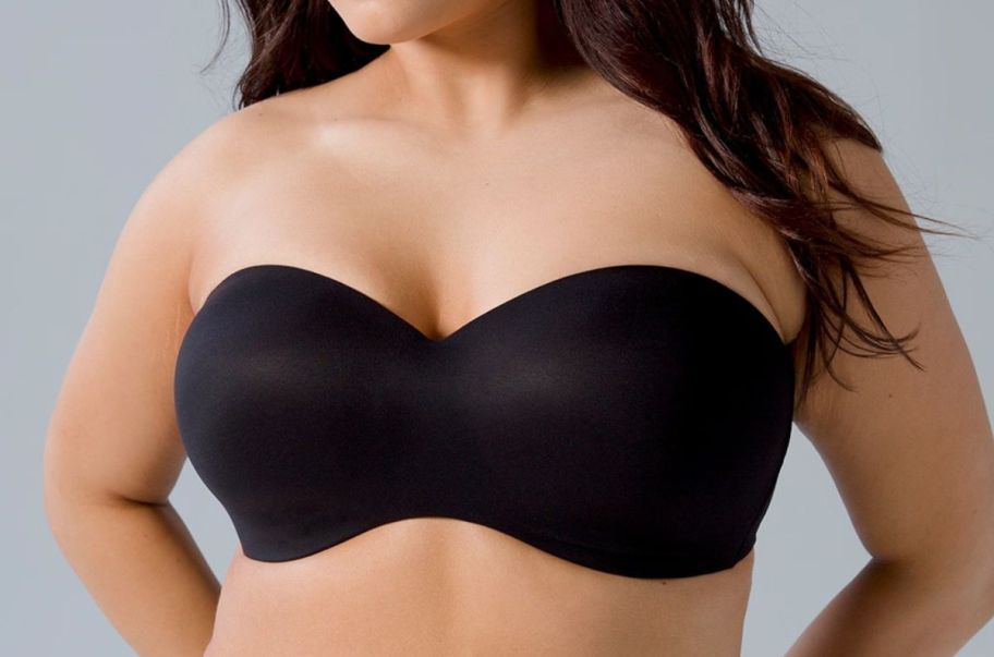 woman wearing a black strapless bra