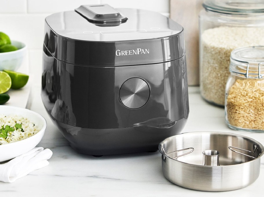 Green Pan rice cooker displayed on top of the table