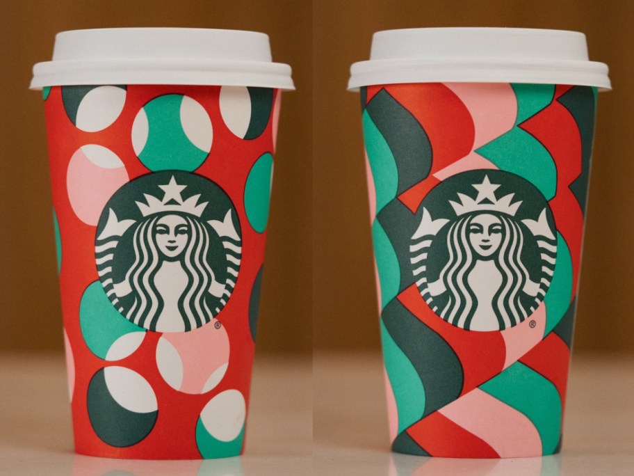 2 Starbucks to go cups in new Holiday 2024 designs on a counter