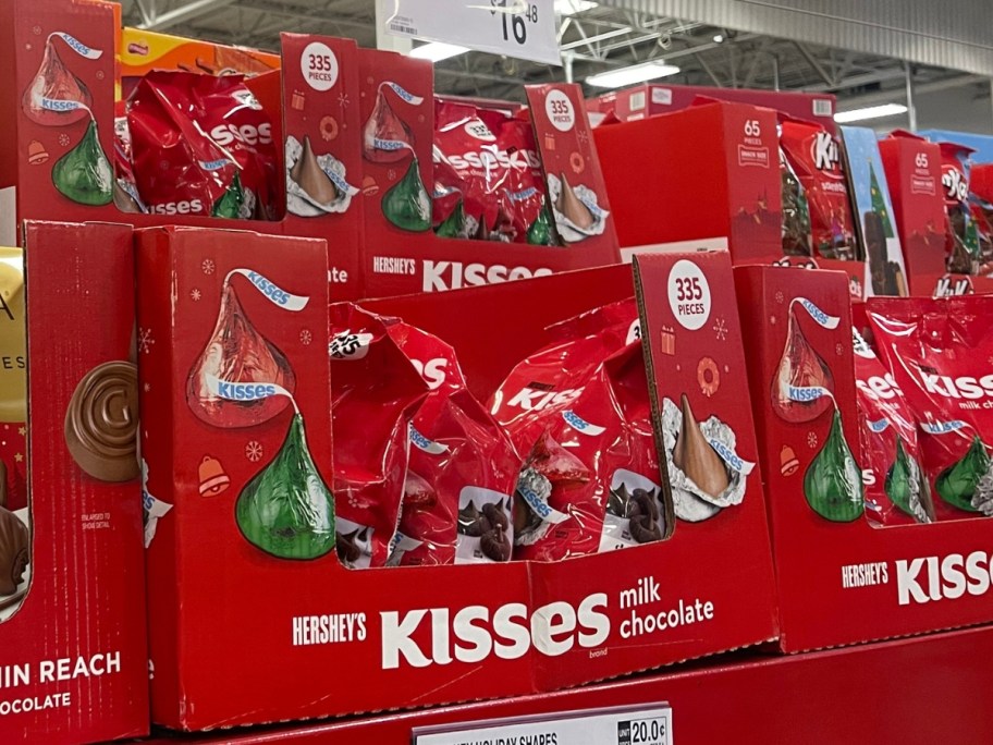 boxes of Hershey’s Kisses Christmas Milk Chocolate Candy large bags on a Sam's club store shelf