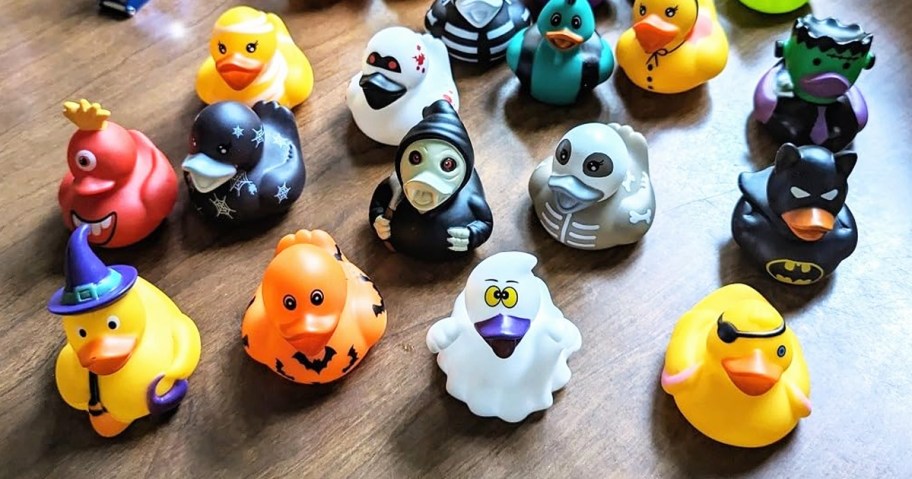 collection of halloween rubber ducks on a table