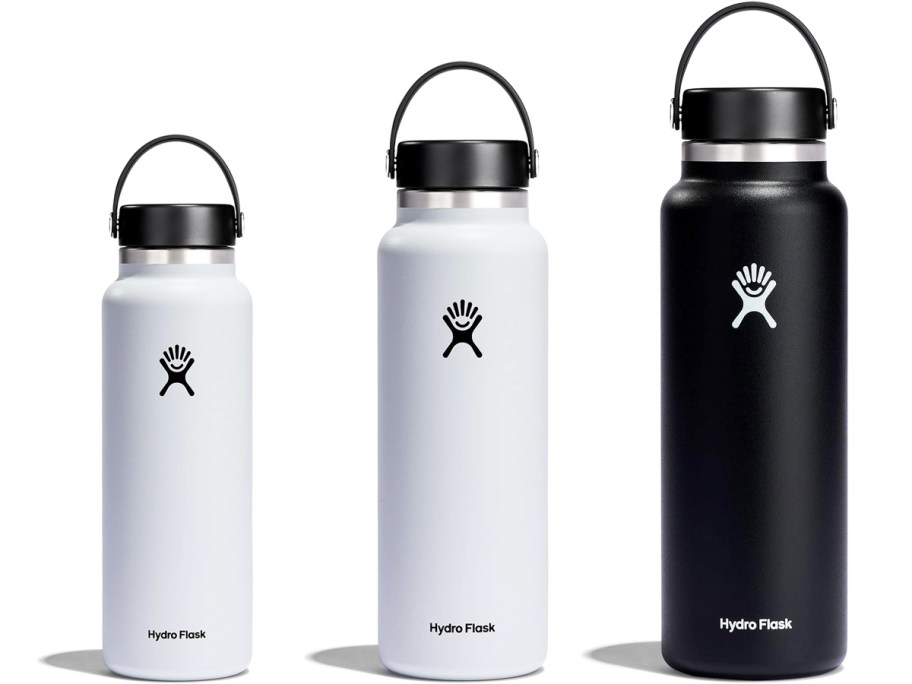 three white and black Hydro Flask bottles