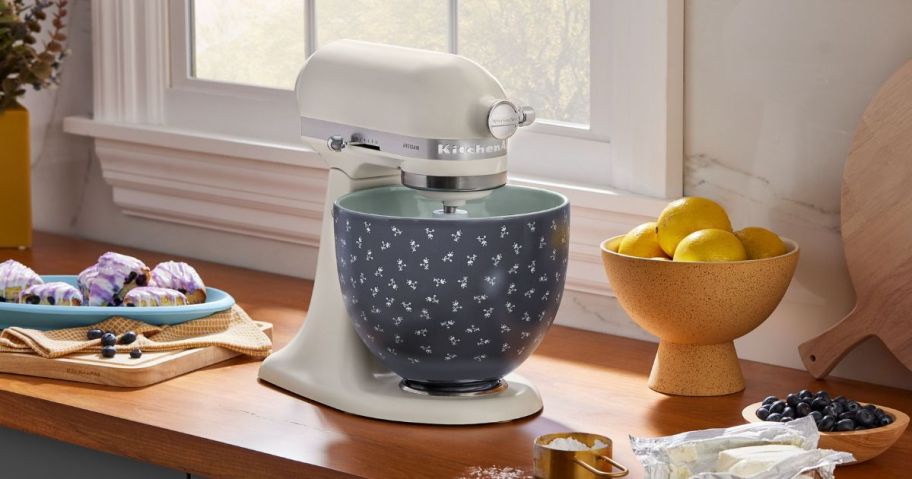 KitchenAid mixer with a vintage floral ceramic mixing bowl