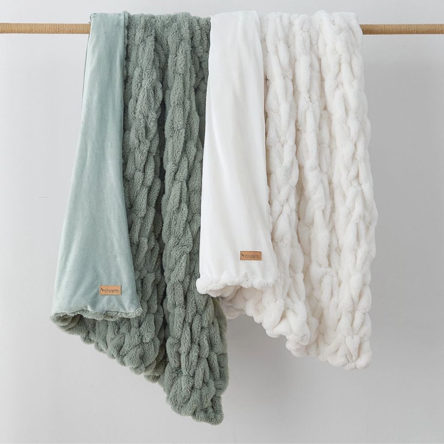 two onlinefy blankets draped over a dowel