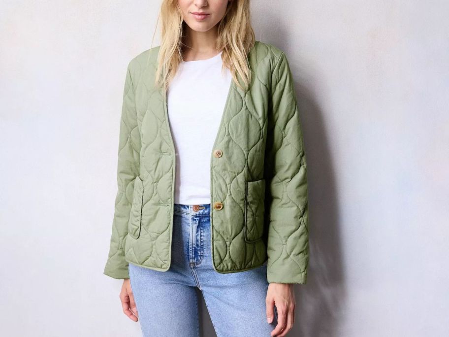 A woman wearing LC Lauren Women's Conrad Quilted Jacket