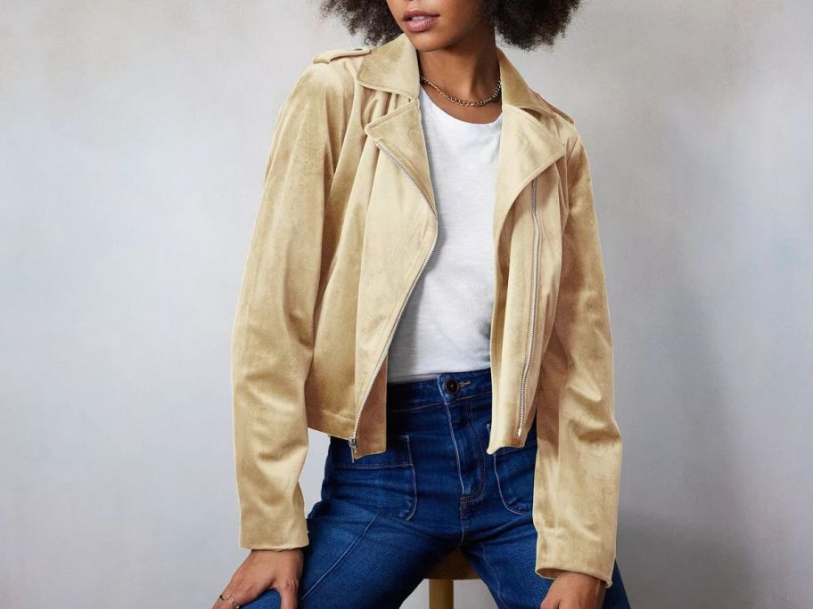 A woman wearing LC Lauren Women's Conrad Suede Moto Jacket