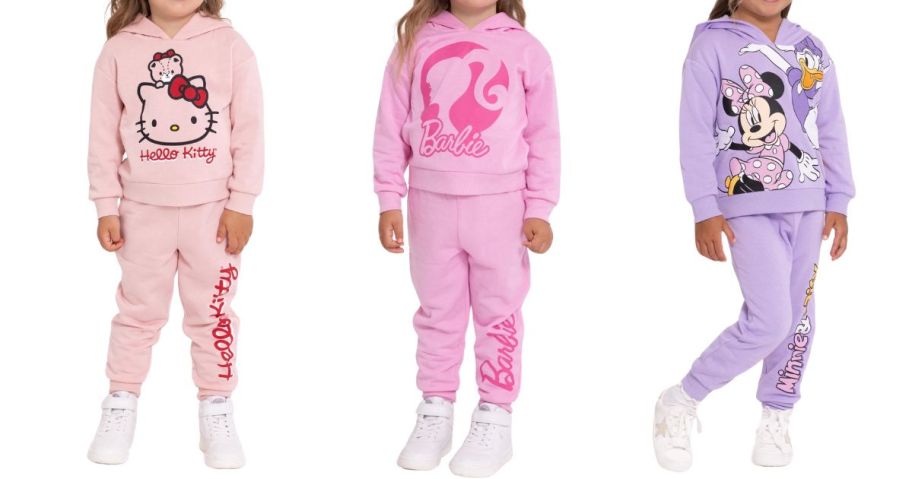 three girls wearing Licensed Character Toddler Girls Graphic Hoodie & Jogger Sets