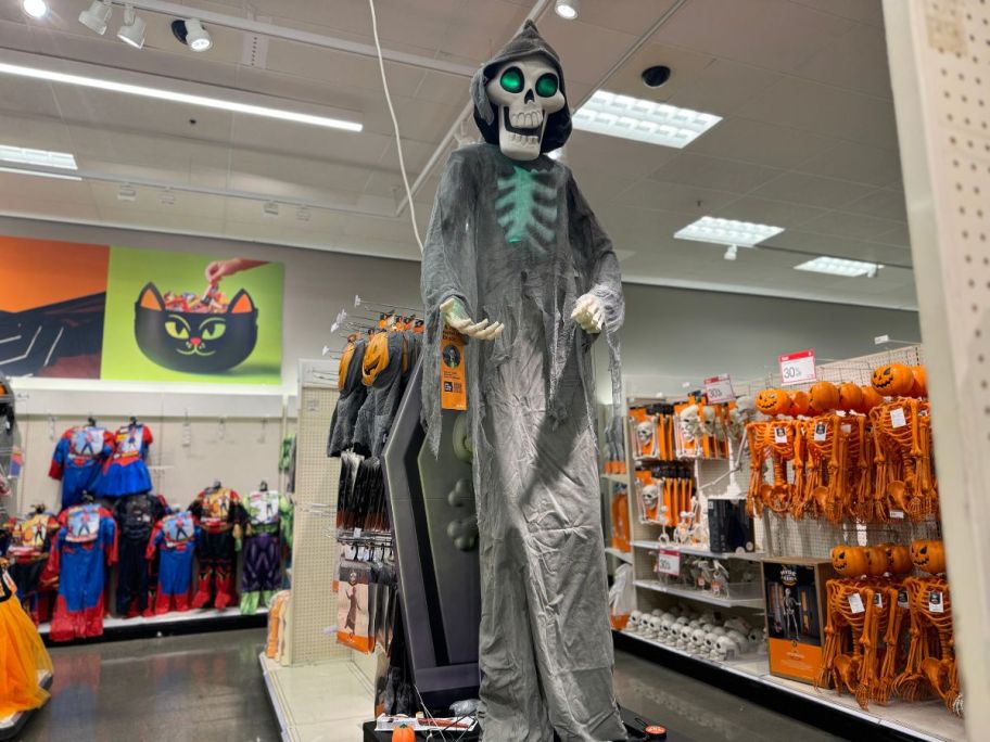 a glowing green-eyed ghoul on display in a target store