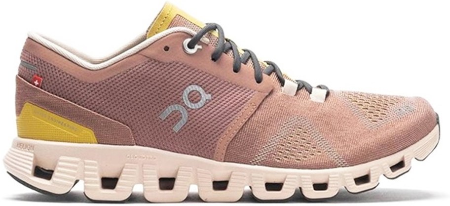 light brown and yellow running shoe