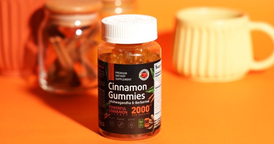 black and orange bottle of Raw Science Cinnamon Gummies