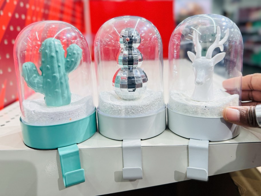 Snow Globe Stocking Holders