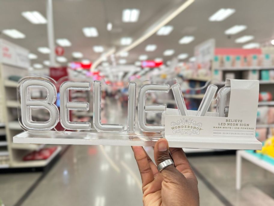 Wondershop Christmas Believe Neon Acrylic Stand in hand in store