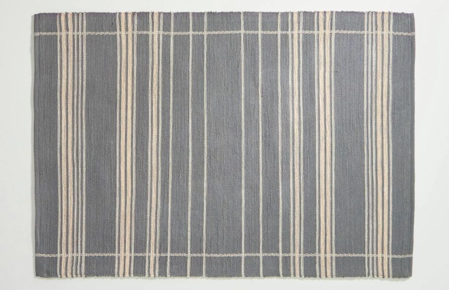 a gray and beige striped area rug