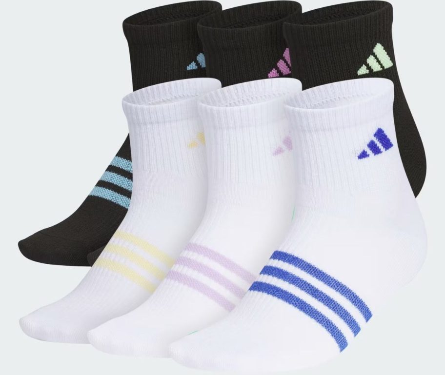 3 pair of white crew socks shown with 3 pair of black crew socks