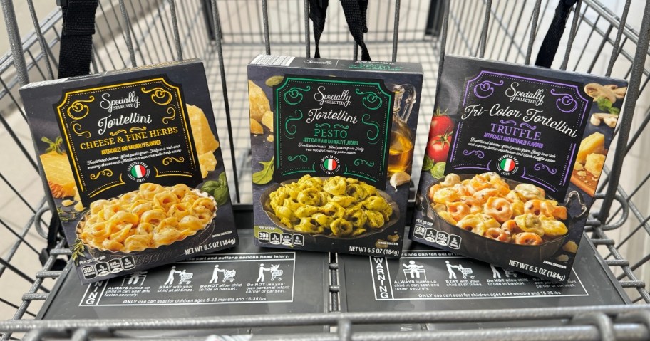 3 different Specially Selected Gourmet Tortellini flavors in boxes in an Aldi Shopping cart