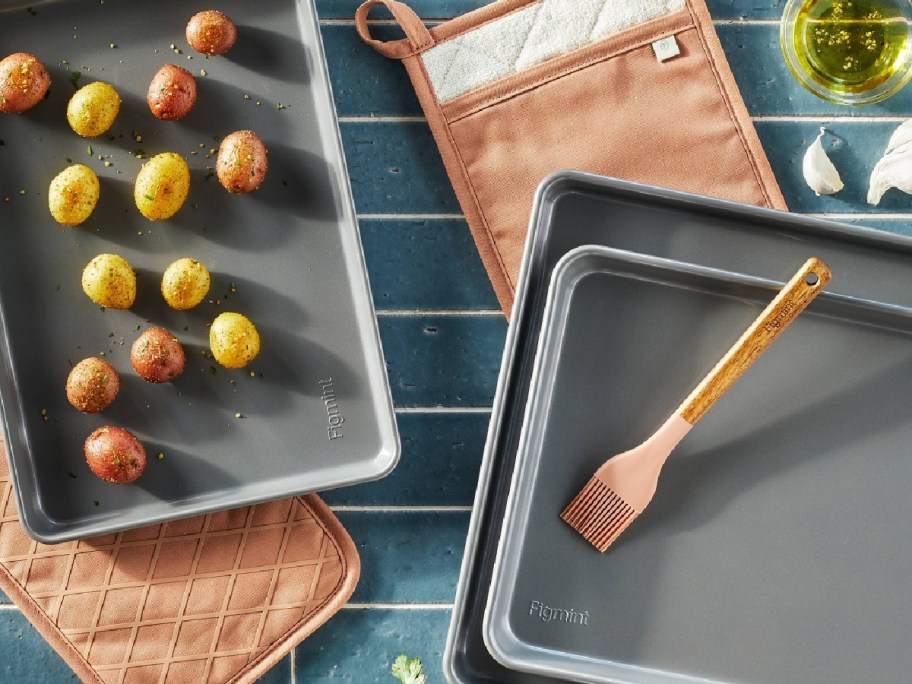 bakeware set in gray with potatoes displayed on it