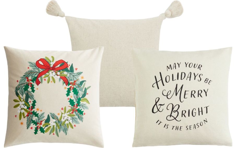 3 pillow covers with holiday themes stock image