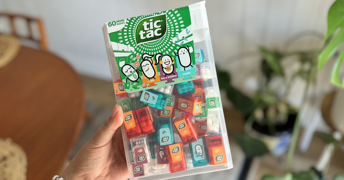 holding Tic Tac box 