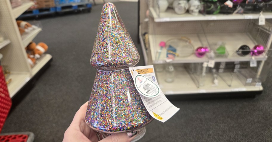 hand holding glitter christmas tree